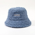 Detailed texture of blue plush faux shearling bucket hat with HaiTalentoM letter patch - M (56-58cm) / Light Blue
