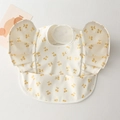 Waterproof baby bib with yellow cherry print and ruffled wings on cream fabric - Wings - White Background With Gold Cherries / One Size