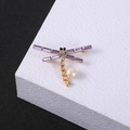 Elegant gold dragonfly brooch featuring purple crystal wings and white pearl detail - Style 19