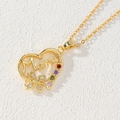Close-up of Mama pendant necklace with colorful zircons and butterfly on gold finish - Heart Mama/Butterfly/Five-Color Zirconia