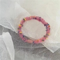 Pink woolen elastic hair tie with colorful speckles and an oval plastic connector - Handmade Wool / Wool Pink