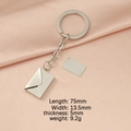 Silver envelope locket keychain with DIY rectangle tag on pink silk background - Steel Color Keychain