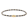 Minimalist handmade beaded bracelet with black faceted beads and gold metal accents - Black