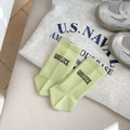 Light green cotton mid-calf socks with GOODLUCK embroidery and ribbed knit texture - Green