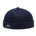 Retro dark blue brimless docker cap with white mountain embroidery for a minimalist look - Adjustable / Navy Blue