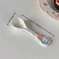 Ceramic spoon with pink strawberry and blue bow design, dimensions 16cm by 4.5cm - Strawberry Love-Long Handle Spoon