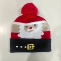 Detail view of knitted Christmas hat with red pom-pom and Santa Claus belt buckle pattern - Santa Belt Style-Christmas Hat