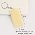 Realistic PVC soda cracker biscuit keychain with authentic texture and silver metal ring - Natural Soda Biscuit Keychain