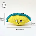 Handmade crochet crescent doll in yellow with dimensions 15cm wide and 7.5cm high - Egg Dumpling