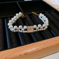 Double-strand freshwater pearl bracelet with a golden square charm on black velvet - Artificial Pearl Bracelet Style 88