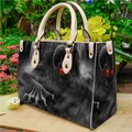 Gothic PU leather tote bag featuring dark skull pattern with red eyes in a garden setting - Dark Skull 0052