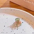 Mini acetate hair claw clip featuring a green and pink marble pattern on a plate - Pink Green Floral