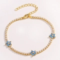 Bracciale tennis dorato con zirconi bianchi e ciondoli a fiori a cinque petali blu - Blu