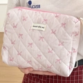 Pink quilted makeup bag with ribbon bow patterns and a secure top zipper closure - Pink Ribbon Bowknot Hand Clutch Bag