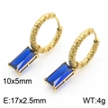 Golden twisted hoop earrings with blue rectangular zircon drop in macro view - Twisted Hoop Earrings (KE111302-KFC) / Gold/Blue