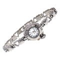 Detailed close-up of a silver quartz watch with hollow heart-shaped metal link strap - Silver/White Dial