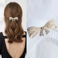 Elegant gold alloy bow hair clip with white pearls and sparkling rhinestones for women - 6cm Beautiful Rhinestone Bow Spring Clip