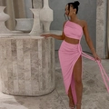 Pink two-piece set featuring a one-shoulder crop top and ruched high-slit maxi skirt - Pink