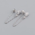 Detail of S925 sterling silver flower earrings with tassel chains and CZ diamonds - 925 Silver / White Gold