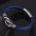 Detailed macro view of blue braided leather bracelet with silver infinity metal clasp - Blue Leather [Steel Color]