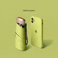 Miniature matcha green folding umbrella next to a smartphone showing compact size - Flat 5-Fold Umbrella + Cloth Sleeve / Matcha Green