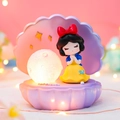 Purple shell night light with a glowing moon and a classic princess figurine - Snow White Shell Lamp