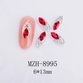 Dettaglio di strass per unghie marquise rossi 6x13mm con base in metallo argento - Stile Marquise Grande Rosso (8995)