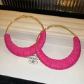 Detail of gold hoop earrings featuring bright fuchsia raffia wrap texture on a jewelry tray - Rose Red Large Round Braided (25# Steel Earring Post)