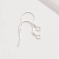 Detailed macro view of S925 sterling silver earring hooks for DIY jewelry making - Silver