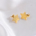 Textured gold star stud earrings with hammered finish on white silk background - Textured Star