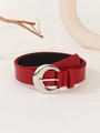 Detail of red crocodile pattern leather belt with a silver C-shaped buckle and needle pin - Stone Pattern Red
