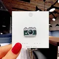Cute green retro camera enamel pin with white backing card for bags and clothing - 75*Vintage Green Camera Pin