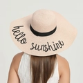 Pink wide brim straw sun hat with black ribbon and hello sunshine embroidery - One Size / Light Pink