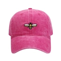 Close-up of a detailed bee embroidery on a vintage washed cotton baseball cap - Adjustable / Rose Red