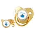 Close-up of golden crown pacifier with blue Prince text and sparkling rhinestones - 10-Gold Prince (Blue Decor)