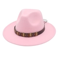 Detail view of the pink fedora hat showing the brown leather band with shell ornaments - Pink