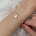 Elegant silver heart charm bracelet with thin chain for women on white lace - Heart Textured Style (SL1458)
