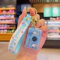 Blue Pochacco camera keychain with a silicone strap and a golden bell accessory - Glowing Camera-Light Blue Dog