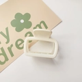 Detail of square matte cream hair claw clip with spring mechanism on a soft background - Matte Small Square White