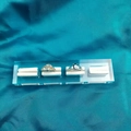 Transparent acrylic ring display stand with four tiers on blue silk background - 4 Slots Clear Base White Velvet 15*3.5CM