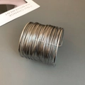 Minimalist multi-layer wound wire open bangle in a polished bright silver finish - Silver Wide Multi-loop Style