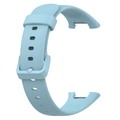 Detail view of the blue silicone replacement strap buckle and adjustment holes for Mi Band 7 Pro - Stretch Blue