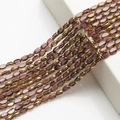 Detailed view of 4x6mm golden edged purple gradient oval glass beads for DIY jewelry - 4x6mm Gold Edged Seed Beads approx. 48pcs/Strand / Purple Gold Edge