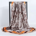 90cm vintage paisley print silk-satin square scarf displayed on a black metal frame - 90x90cm / Orange (Paisley)