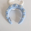 Light blue plush sponge headband with artificial pearl embellishments on white cloud tray - Blue With Pearls