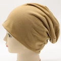Slouchy knit beanie in camel brown color displayed on a mannequin head - Adjustable / Khaki