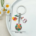 Porte-clés de Noël en émail avec bonhomme de neige et couronne aux couleurs festives - Chaussette de Noël et Couronne de Bonhomme de Neige (ER828)