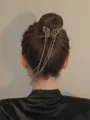 Elegant butterfly hair clip with silver tassels and rhinestones on model hairstyle - Tassel Butterfly Gun Black Hair Claw