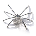 Macro detail of a decorative silver metal spider featuring a natural crystal quartz belly - Irregular Clear Quartz