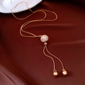 Detail of adjustable gold-plated vintage tassel necklace with pavé crystal sphere on velvet - Real Gold Plated Gold
